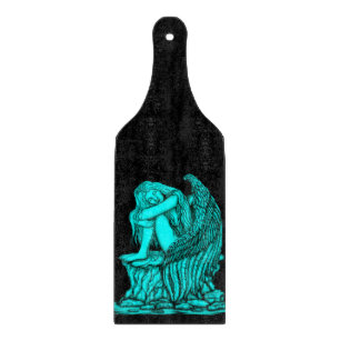 Planche À Découper Un ange endormi sur la pierre