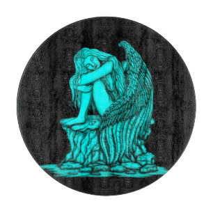 Planche À Découper Un ange endormi sur la pierre