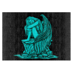 Planche À Découper Un ange endormi sur la pierre