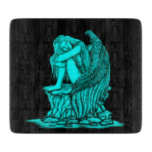 Planche À Découper Un ange endormi sur la pierre