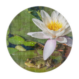 Planche À Découper Une grenouille sous une fleur de nénuphar