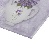 Planche À Découper Violettes Dans Une Théière (Coin)