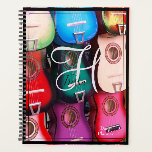 Planificateur quotidien avec guitares sur couvertu (Devant)