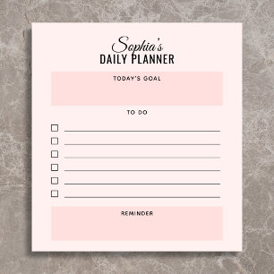 Planificateur quotidien bloc-notes rose pâle écrit