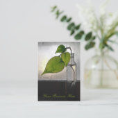 Plant in een Antiek helder glazen flesje Visitekaartje (Staand voorkant)