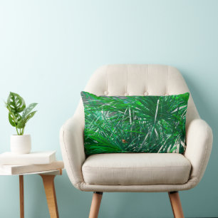 Plant met groene palmboom verlaat pastel kussen