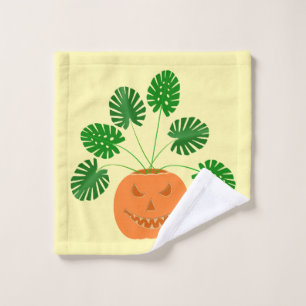 Plante Monstera Halloween dans une citrouille