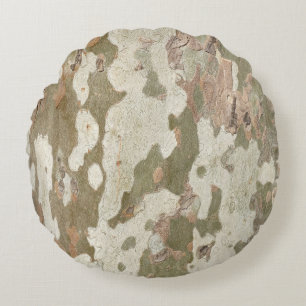 Plantenboomcamouflage ziet uit op barstpatroon rond kussen