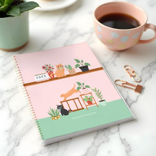 Plantes de maison à pots et chats joyeux