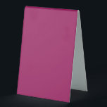 Plaque De Table un fond rose avec une bordure blanche<br><div class="desc">Imaginez que vous entrez dans un événement où chaque détail parle de sophistication,  de chaleur et de conception réfléchie. Lorsque les invités prennent leur siège,  leurs yeux sont attirés par un présentoir de table magnifiquement conçu - pas seulement un marqueur,  mais un conteur.</div>