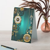 Plaque De Table Veille bijoux Steampunk sur un Arrière - plan vert (En SItu (Tableau))