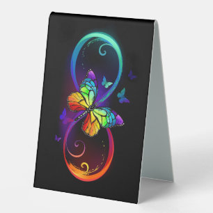 Plaque De Table Vibrant infinity with rainbow butterfly on black