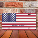 Plaque D'immatriculation American Flag Ajouter votre texte personnalisé<br><div class="desc">Ajoutez un texte et créez facilement votre plaque d'immatriculation personnalisée. Cliquez sur PERSONNALISER pour modifier la couleur du texte. Vous pouvez TRANSFÉRER ce DESIGN sur d'autres produits Zazzle et l'ajuster à la plupart des articles Zazzle. Les conceptions Studio standard sont faites dans des graphiques vectoriels haute résolution pour une impression...</div>