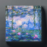 Plaque Monet Water Lilies<br><div class="desc">Plaque Monet Water Lilies. Peinture à l'huile sur toile de 1916. Monet peint son fameux bassin de nénuphars de manière obsessionnelle pendant les dernières années de sa carrière, puisant son inspiration dans la lumière du soleil et son effet changeant sur l'eau, les fleurs aquatiques et le feuillage. Ce tableau, qui...</div>