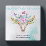 Plaque Photo Citation inspirée du crâne animal Boho Let Go<br><div class="desc">A photo plaque which says: let go of the things you cannot control. Design with a turquoise and pastel watercolor background A boho chic animal skull with a floral bouquet upon its head and little butterflies fluttering about. A cute decorative border with little teardrop shapes in light blue.</div>