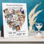 Plaque Photo Heart Photo Collage Aimer You Marry Me<br><div class="desc">Plaque de collage en forme de coeur avec 20 de vos photos préférées. Will You Marry Me ? est écrit en calligraphie tourbillonnant élégante et vos photos sont affichées en format carré sur des arrière - plans de style instantané dans un montage d'images en forme de coeur. Vous pouvez également...</div>