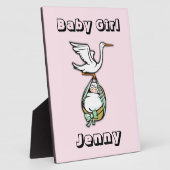 Plaque Photo La cigogne porte une petite fille (Côté)