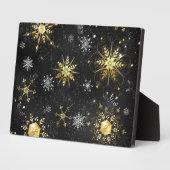 Plaque Photo Les flocons dorés de Noël sur l'Arrière - plan noi (Côté)