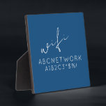Plaque Photo Mot de passe WiFi personnalisé en bleu<br><div class="desc">Facilitez la connexion Wi-Fi grâce à cette plaque bleue personnalisée qui affiche votre nom de réseau et votre mot de passe. Le design comprend un arrière - plan bleu moderne avec du texte blanc et une zone personnalisable pour les détails de votre réseau. Cette version du produit est de 5.25x5.25...</div>