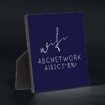 Plaque Photo Panneau de signalisation Navy Blue WiFi avec Easel<br><div class="desc">N'oubliez plus jamais votre mot de passe WiFi avec cette plaque de signe de mot de passe bleu marine. Mesurant 5, 25 x 5, 25 pouces, cette plaque présente un design épuré et moderne avec script et lettrage simple, facile à lire. Le panneau est livré avec un support de chevalet...</div>