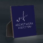Plaque Photo Panneau de signalisation Navy Blue WiFi avec Easel<br><div class="desc">N'oubliez plus jamais votre mot de passe WiFi avec cette plaque de signe de mot de passe bleu marine. Mesurant 5, 25 x 5, 25 pouces, cette plaque présente un design épuré et moderne avec script et lettrage simple, facile à lire. Le panneau est livré avec un support de chevalet...</div>