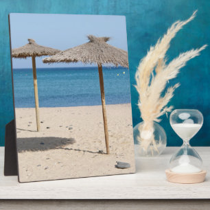 Plaque Photo Parapluies de plage en chaume