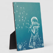 Plaque Photo Petite fille qui souffle sur un pissenlit (Côté)