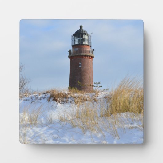 Plaque Photo Phare de Sturdy sur une côte rocheuse en hiver (Devant)