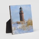 Plaque Photo Phare de Sturdy sur une côte rocheuse en hiver (Recto)