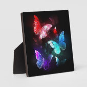 Plaque Photo Trois papillons brillants sur l'arrière - plan de (Recto)