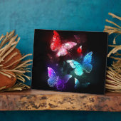 Plaque Photo Trois papillons brillants sur l'arrière - plan de (Côté)