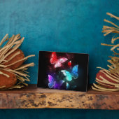 Plaque Photo Trois papillons brillants sur l'arrière - plan de  (Côté)