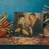 Plaque Photo Un rabbin attache les Phylacteries au bras d'un ga (Côté)