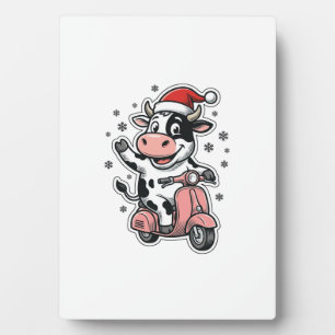 Plaque Photo Vache de Noël à scooter rose vintage vecteur_1