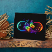 Plaque Photo Vibrant infinity with rainbow butterfly on black (Côté)