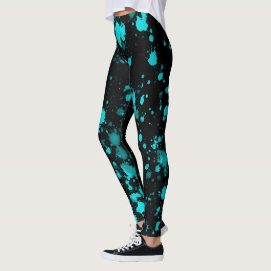 Plaques de peinture bleue sur les Leggings noirs (Gauche)