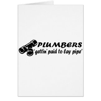 Plombiers "obtenant payés pour poser le tuyau "