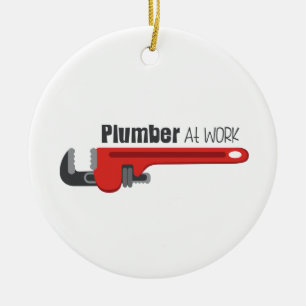 Plumber op het werk keramisch ornament