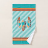 Plumes en Turquoises stries et couleurs du désert. (Serviette à main)