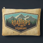 Pochette À Accessoires Road Trips & Shenanigans Outdoor Patch Zipper Bag<br><div class="desc">If you love road trips to National Parks, this zipper bag is for you! This fun road trip design features a National Parks inspired patch with a row of mountains and trees. The wording on this pouch reads "RoadTrips and Shenanigans" in orange. You can customize your bag with your name....</div>
