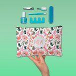 Pochette À Accessoires Rose Floral Monogramme<br><div class="desc">Le motif floral rose élégant présente vos initiales monogrammes sur le devant de ce petit sac accessoire. Parfait pour les cosmétiques, coque crayon, stocker vos cordons de charge ou tout autre chose. Mesures 8, 5 po x 6 po (transfert à la taille plus grande), ce sac est fait avec une...</div>