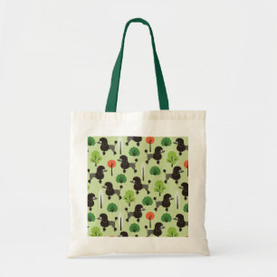 Poedel in het park tote bag