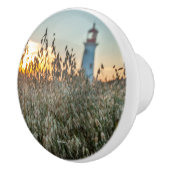 poignée de porte, photo d'une phare dans un champs (Droite)