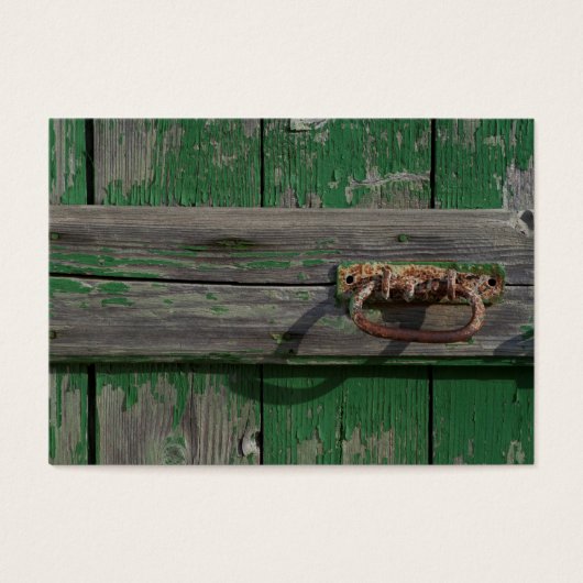 Poignée de porte rouillée sur porte verte (Devant)