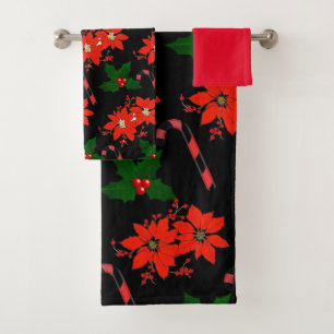 Poinsettia rouge de Noël et feuilles de houx 