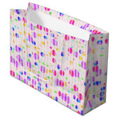 Points colorés sur le sac cadeau rose (Devant Angle)