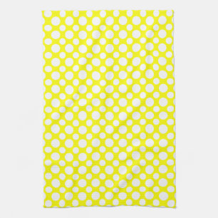 Pois blancs sur serviette de cuisine jaune