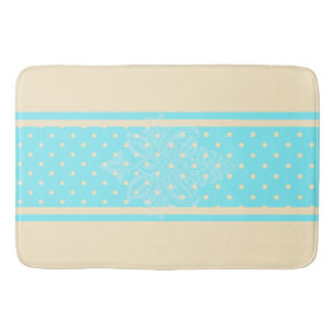 Pois bleus et tapis de bain jaune