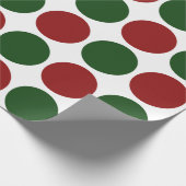 Pois rouges et verts sur emballage cadeau blanc (Coin)
