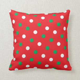 Pois sur le coussin rouge de jet de Noël